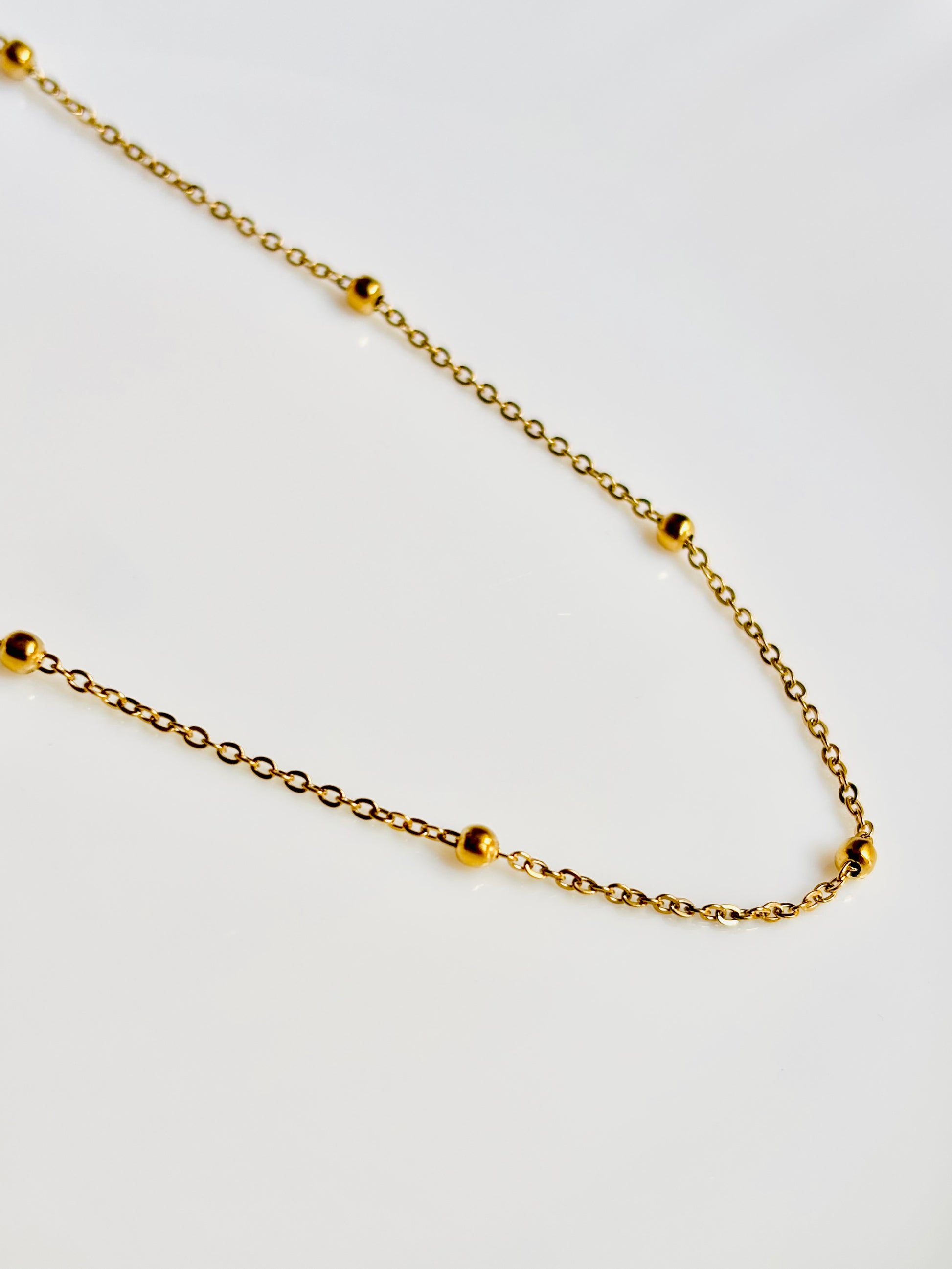 golden, shiny, classic, rust free, allergy free, neck, classy