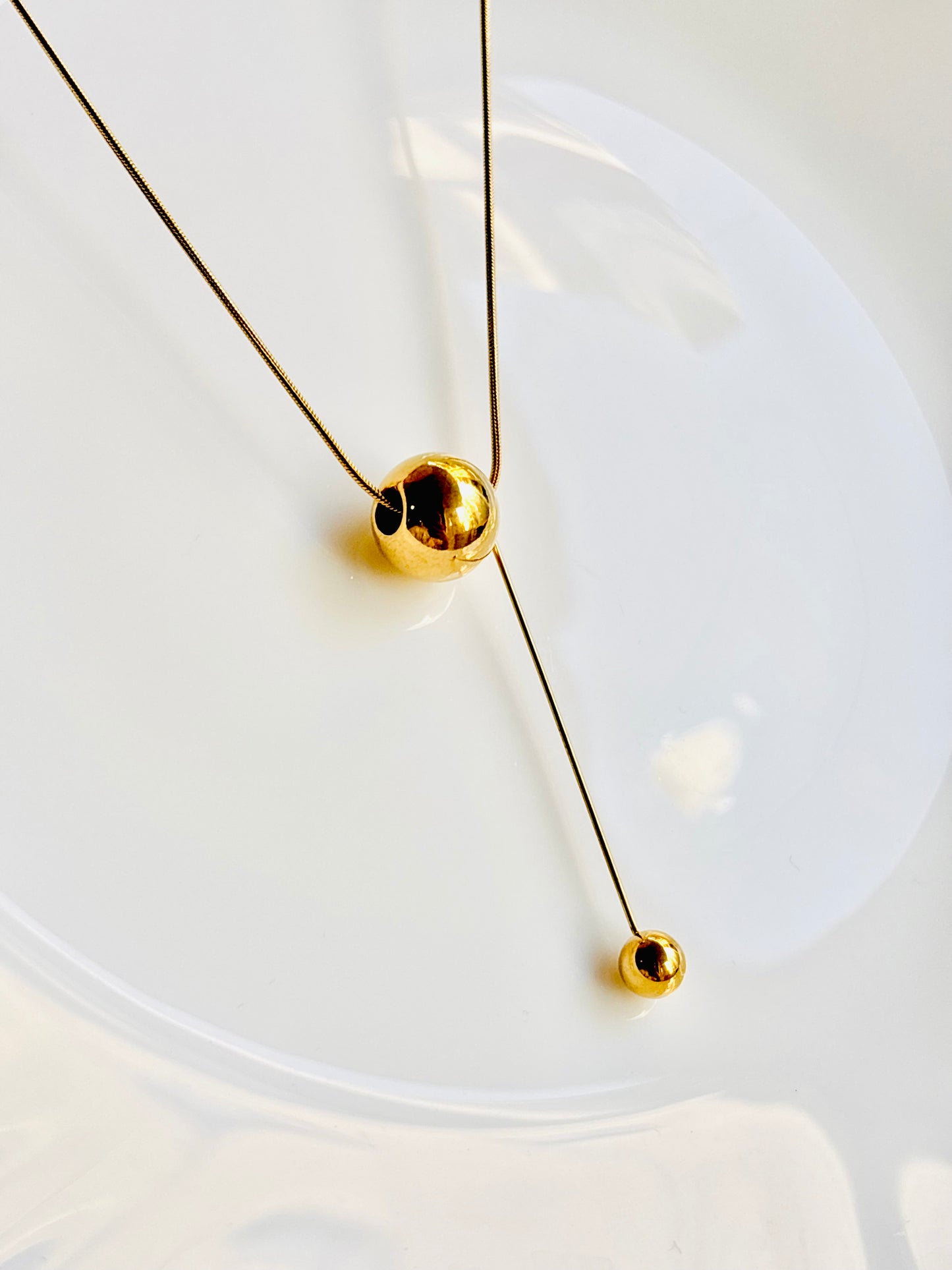 Pendulum pendant, shiny, infinity, stylish, gold plated, stainless steel, classy