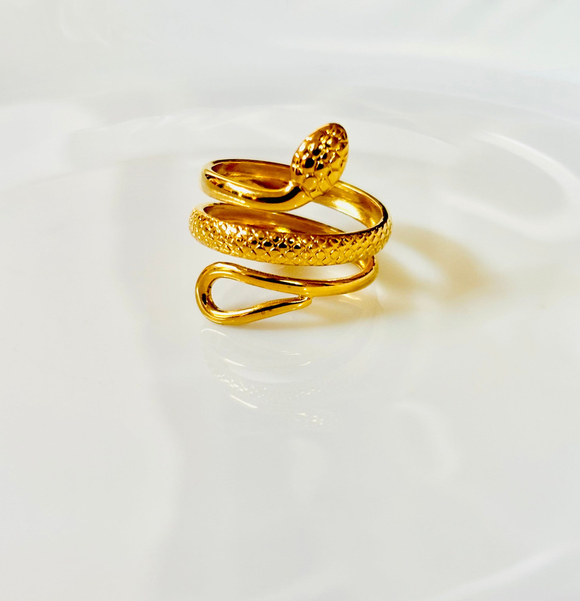 Gold snake-shaped ring with three layers